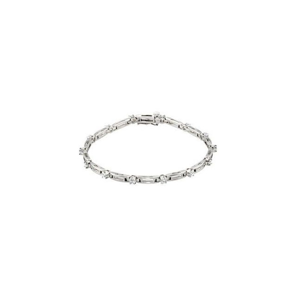 Wonderful modern style is found in this 14Kt white gold diamond tennis bracelet featuring a total carat weight of 1 1/3 carats. Total length of the bracelet is 7.25 inches.