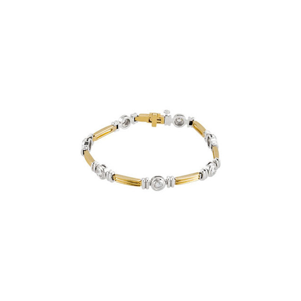 Simple and brilliant, this classic tennis 7.5" bracelet features 7 round, brilliant diamonds set in 14k yellow/white gold.