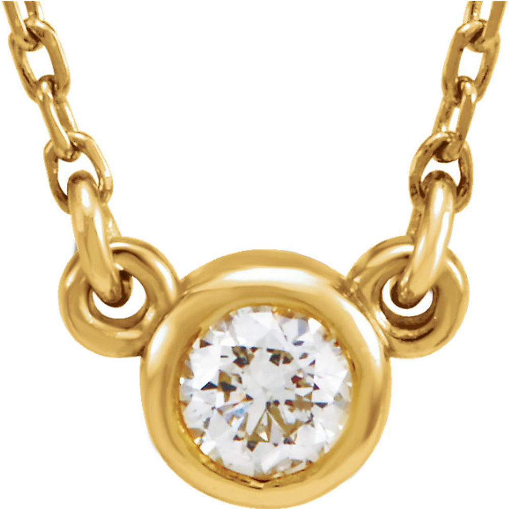 This dazzling pendant features a sparkling 1/6 carat round diamond solitaire set in 14 karat yellow gold. An 18 inch diamond cut cable chain with a spring ring clasp is included. Delight your sweetheart with the gift of this romantic pendant!