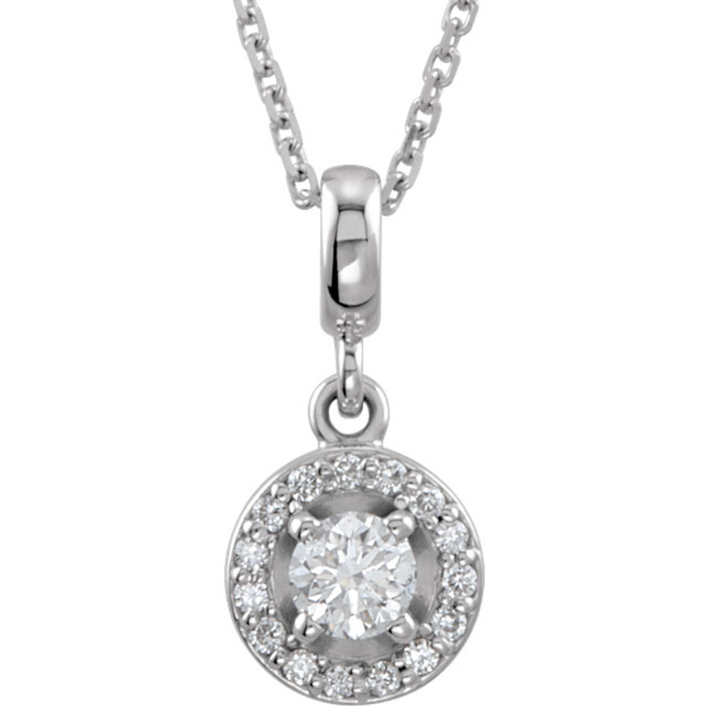 If you want to make a real entrance, don this dramatic diamond pendant necklace. All eyes will be on you and your jeweled d'colletage. You will be instantly transfixed into the one they all want to know even if they are not the actual guest of honor. Set in 14K white gold, this pendant weighs 1/4 ct. tw. and has a bright polish to shine.