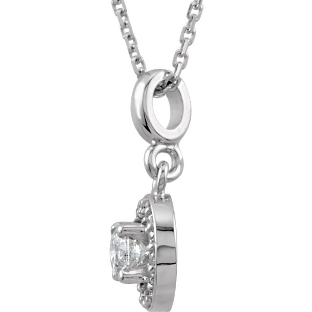 If you want to make a real entrance, don this dramatic diamond pendant necklace. All eyes will be on you and your jeweled d'colletage. You will be instantly transfixed into the one they all want to know even if they are not the actual guest of honor. Set in 14K white gold, this pendant weighs 1/4 ct. tw. and has a bright polish to shine.