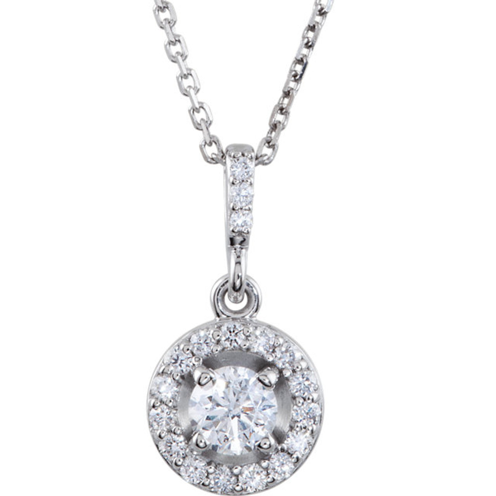 14 karat white gold diamond necklace featuring shimmering white diamonds which articulate beautifully. The total carat weight of white diamonds is 3/4 carat.