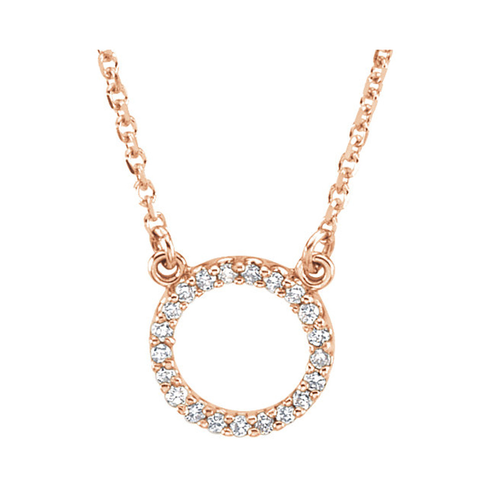 This necklace features a dazzling assortment of round diamonds set in a circle of 14K rose gold. Comes with an 16 Inch necklace. The total diamond weight is 1/10 ct . A very fine piece of jewelry.