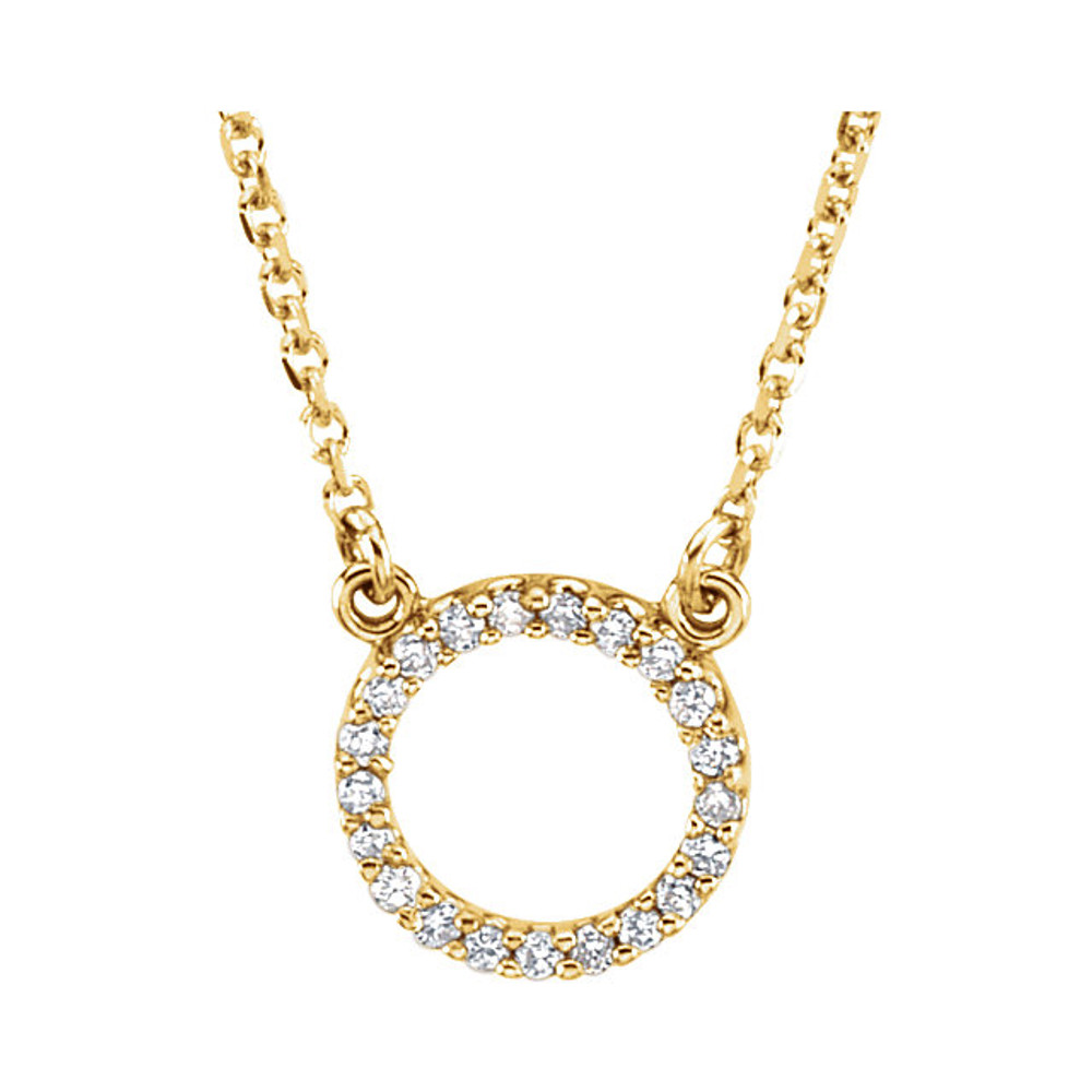 This necklace features a dazzling assortment of round diamonds set in a circle of 14K yellow gold. Comes with an 16 Inch necklace. The total diamond weight is 1/10 ct . A very fine piece of jewelry.