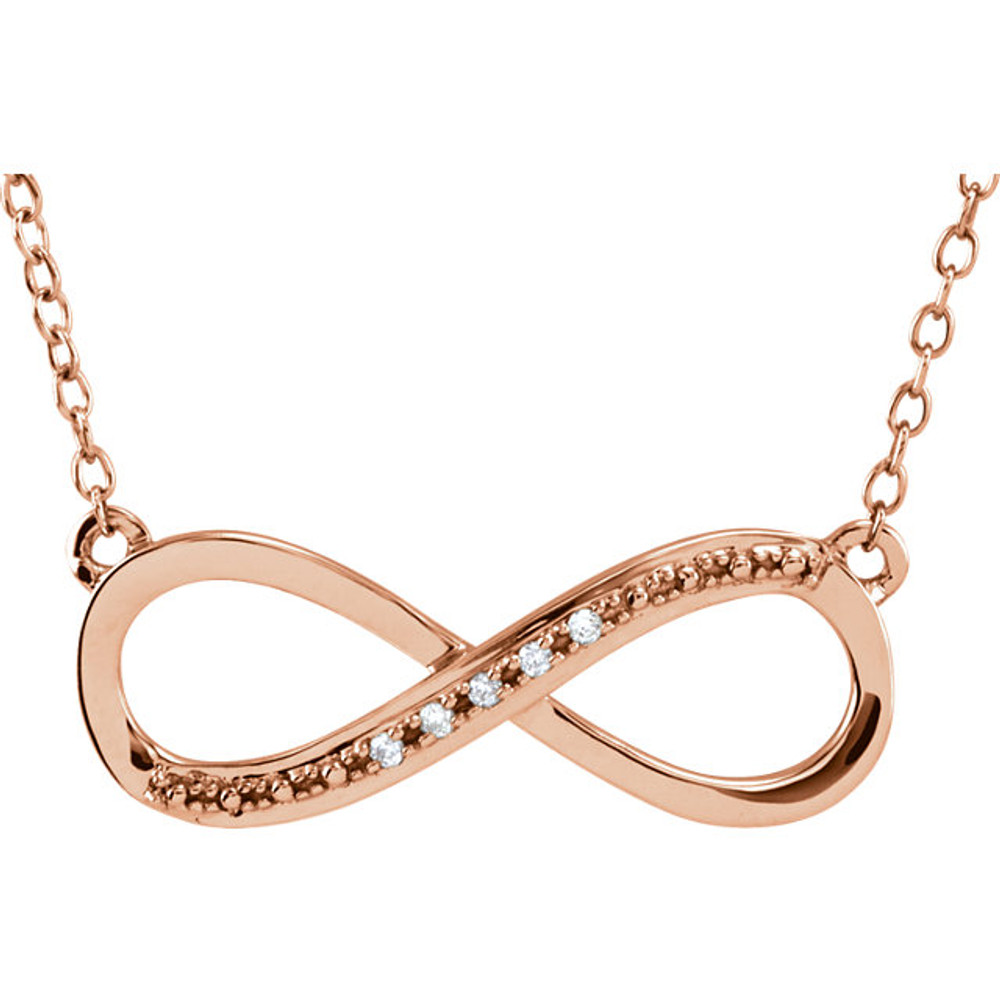 Simple 14k rose gold diamond infinity necklace. Diamonds are an accent in this necklace design, they total .025ct tw. Wonderfully symbolic design means forever, what a loving gift.