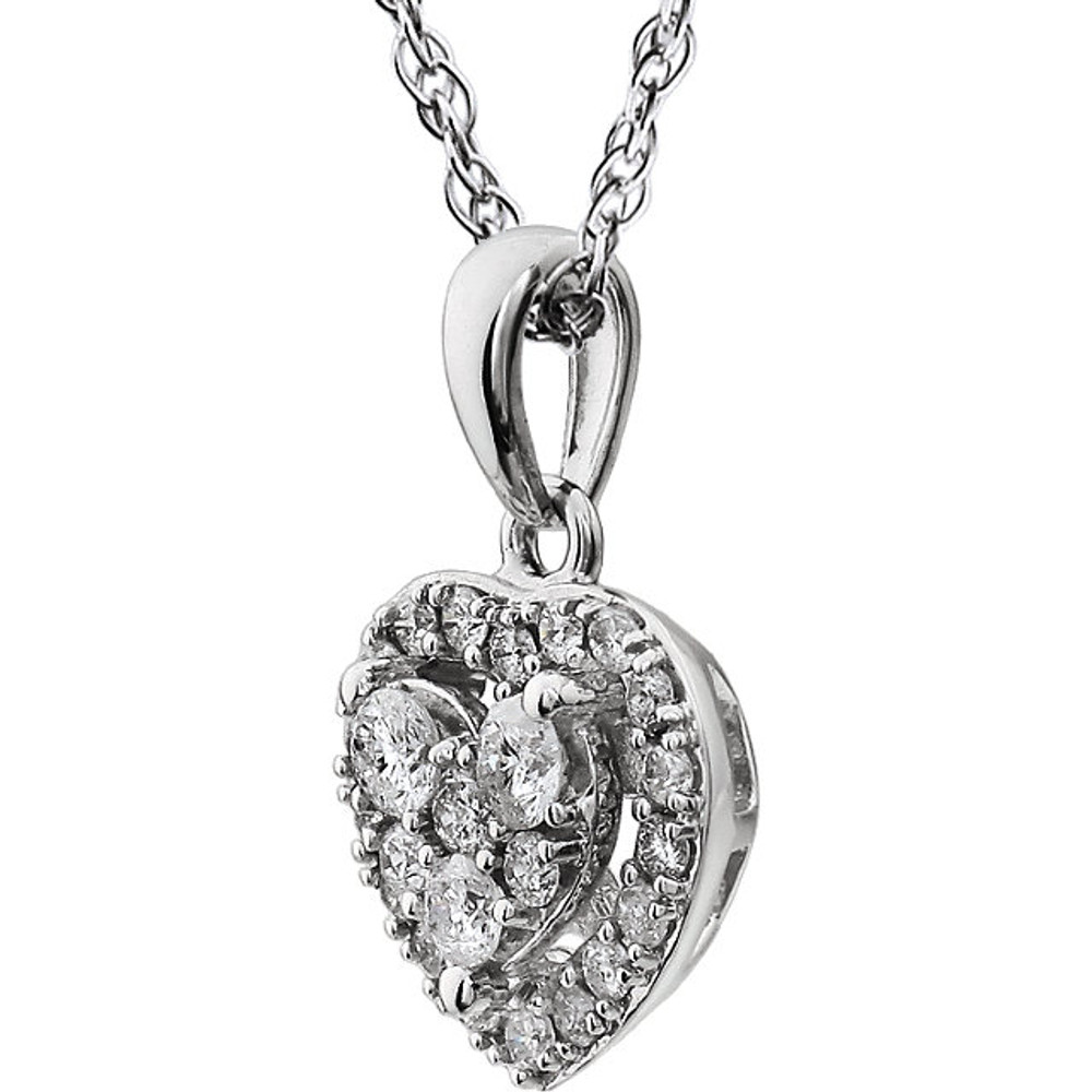 Beautiful 14Kt white gold halo-style heart necklace features white shimmering diamonds with 3/8 carats of diamonds hanging from a 18" inch chain which is included. 