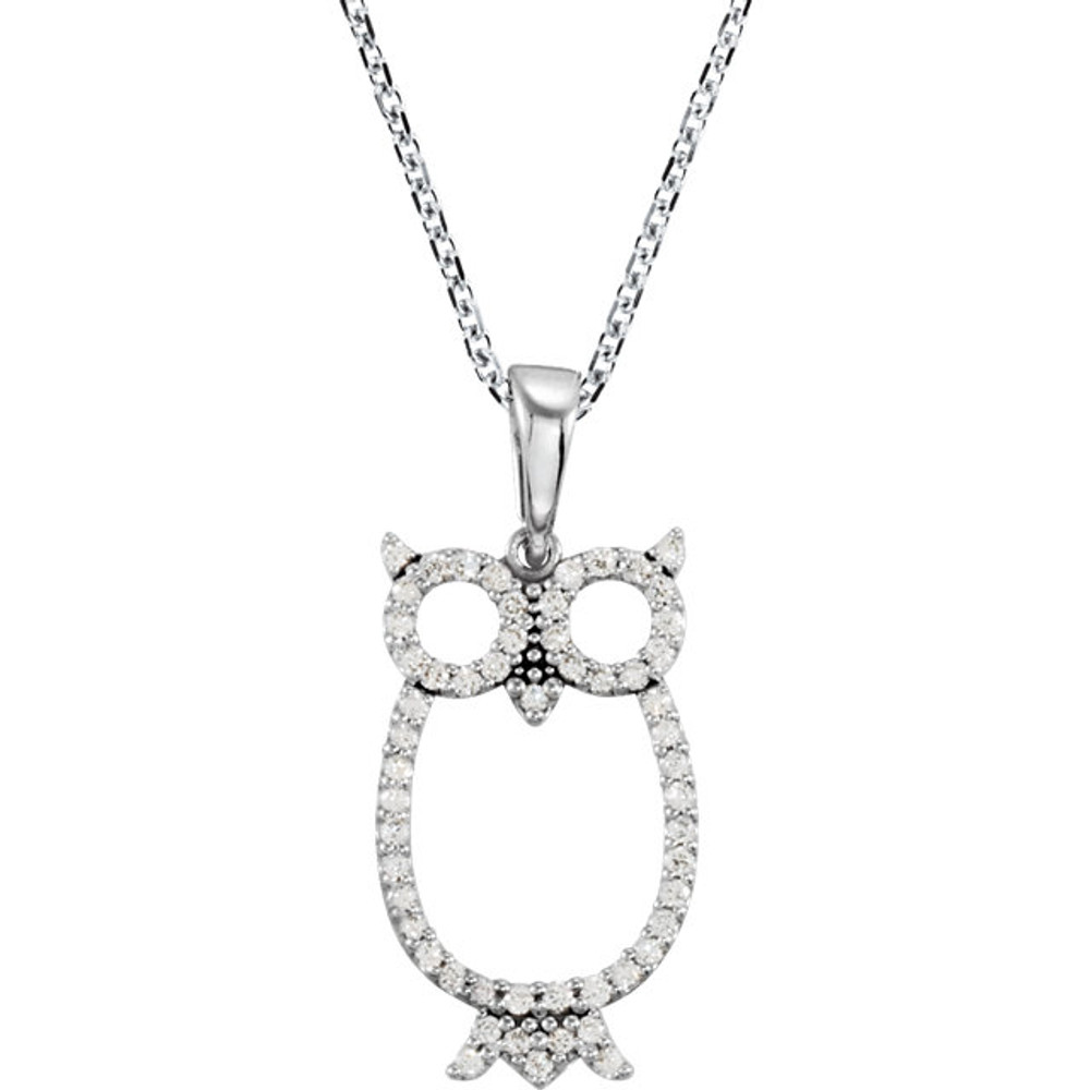 Beautiful 14Kt white gold owl necklace featuring white shimmering diamonds with 1/4 carats of diamonds hanging from a 16" inch chain which is included. 