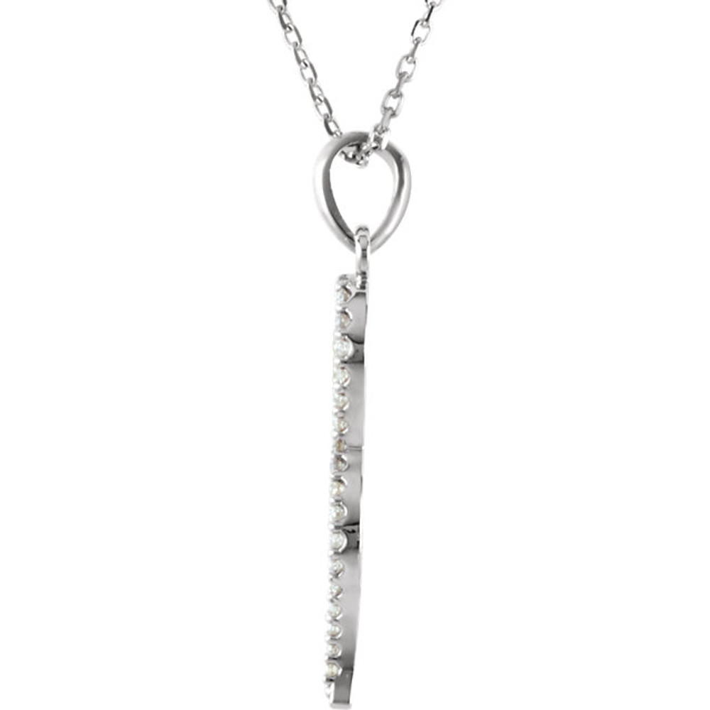 Beautiful 14Kt white gold petite snake necklace featuring white shimmering diamonds with 1/6 carats of diamonds hanging from a 16" inch chain which is included.