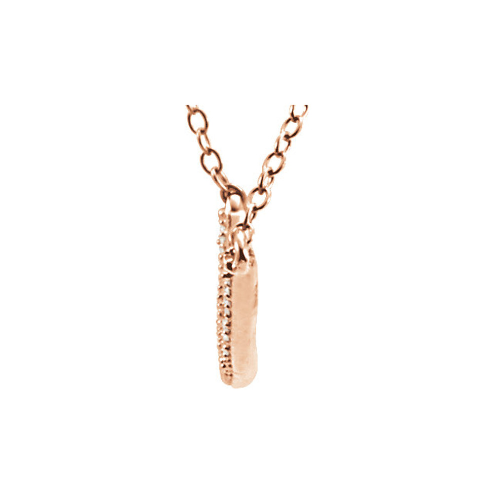 Beautiful 14k rose gold diamond bar necklace hanging from a 16-18" inch chain which is included. Polished to a brilliant shine.