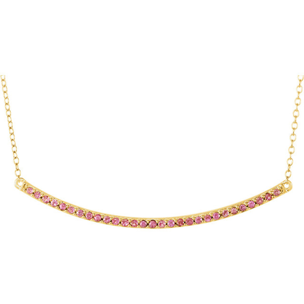 Beautiful 14k yellow gold pink sapphire bar necklace hanging from a 16-18" inch chain which is included. Polished to a brilliant shine.
