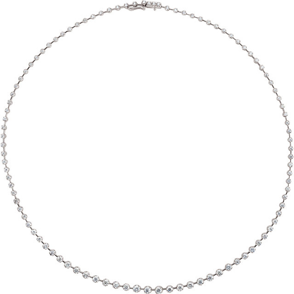 This diamond 18" necklace is all you need to enhance your favorite gown. Set in 14Kt white gold with 98 sparkling diamonds weighing 5.00 ct. tw., this will be your go-to necklace for fine affairs.