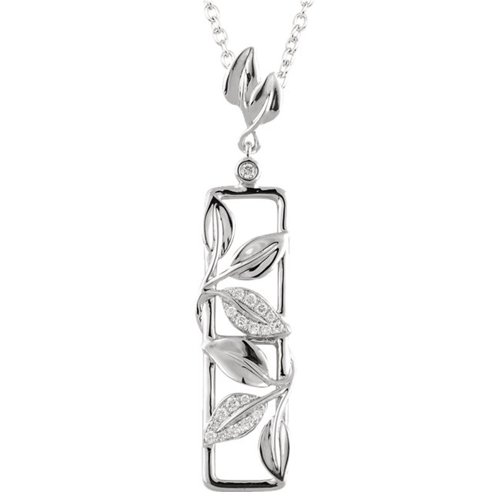 Beautiful 14Kt white gold leaf design necklace features white shimmering diamonds with 1/8 carats of diamonds hanging from a 18" inch chain which is included.