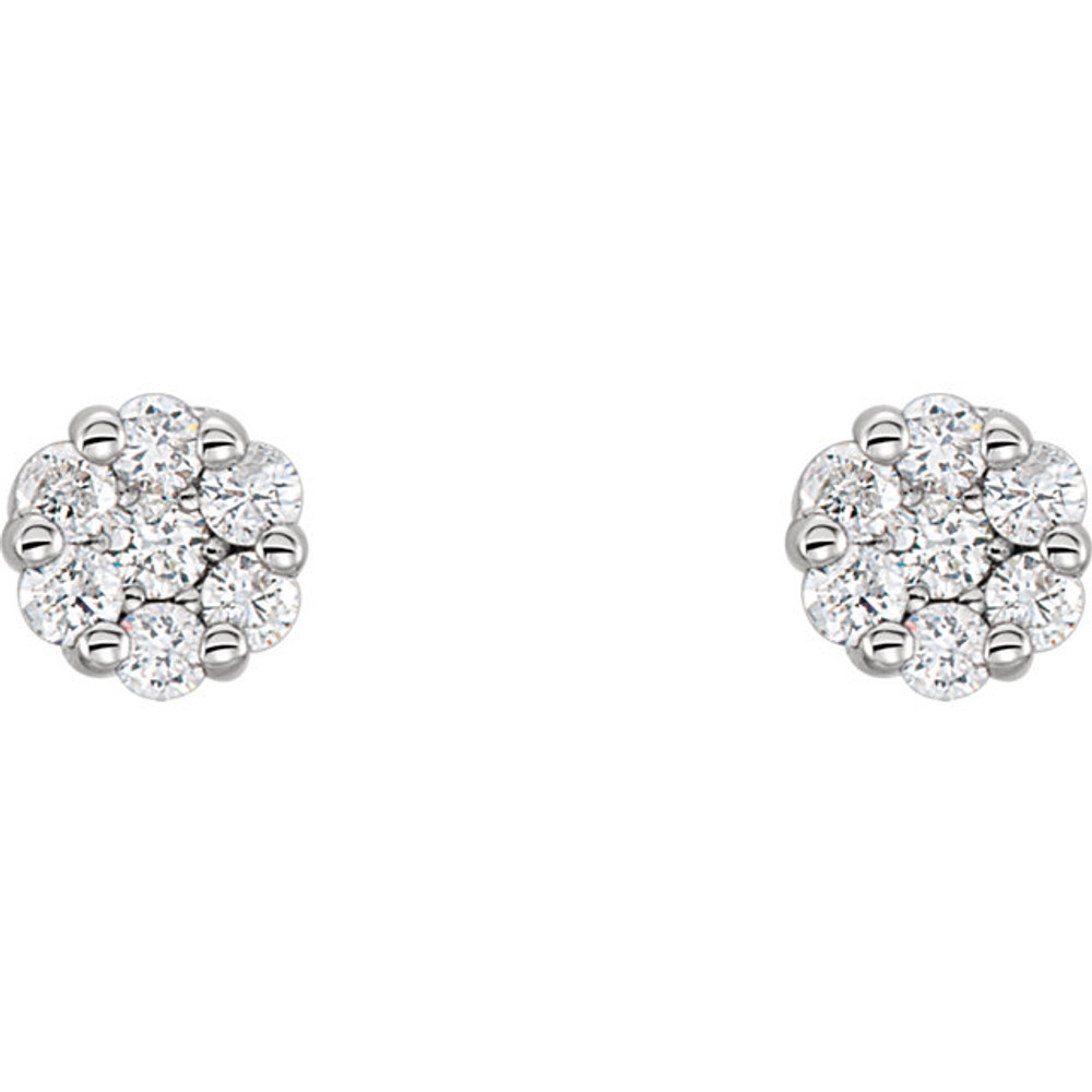 Good things come in small packages, as you can plainly see with our diamond cluster shaped earrings. With the beauty of 14 diamonds weighing .25cts tw, these earrings have all of the beauty of larger earrings in a smaller package. Set in elegant 14Kt white gold, they are great earrings to buy for yourself or for someone else.