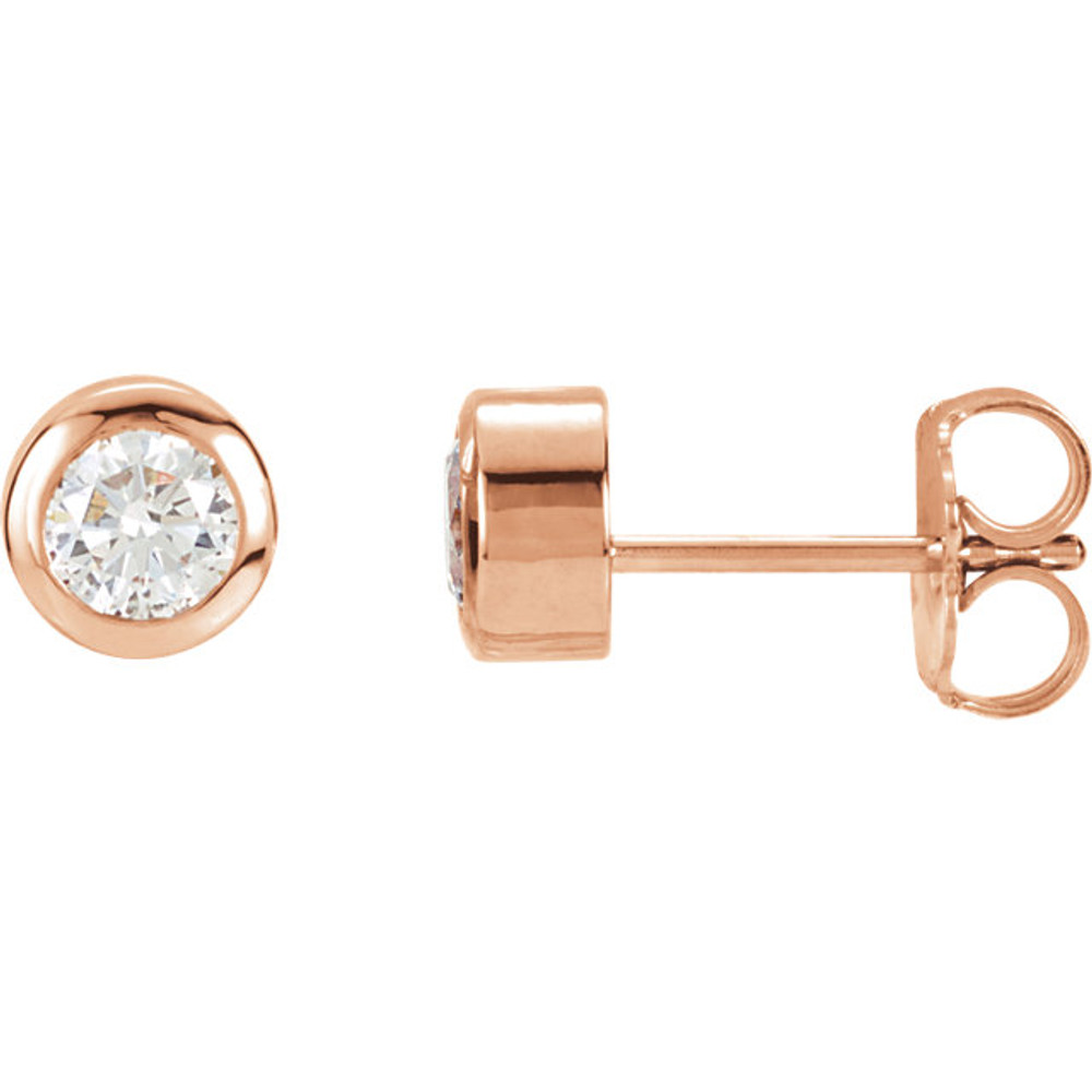 These are a beautiful pair sparking center diamonds in these lovely earrings. Crafted in romantic 14K rose gold, the earrings have a total diamond weight of 1.00 carat and are secured with friction backs.