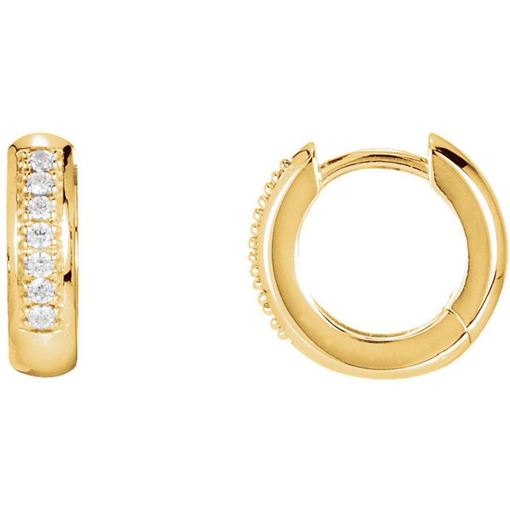 Perfect for a look of sheer elegance, these hoop earrings features one row of sparkling round brilliant diamonds framed in 14k yellow gold.