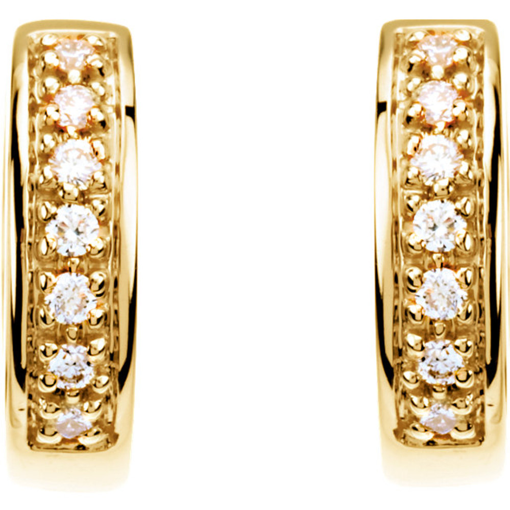 Brilliant diamonds adorn these petite hoop earrings in 14k yellow gold. A versatile look for evening or everyday wear.