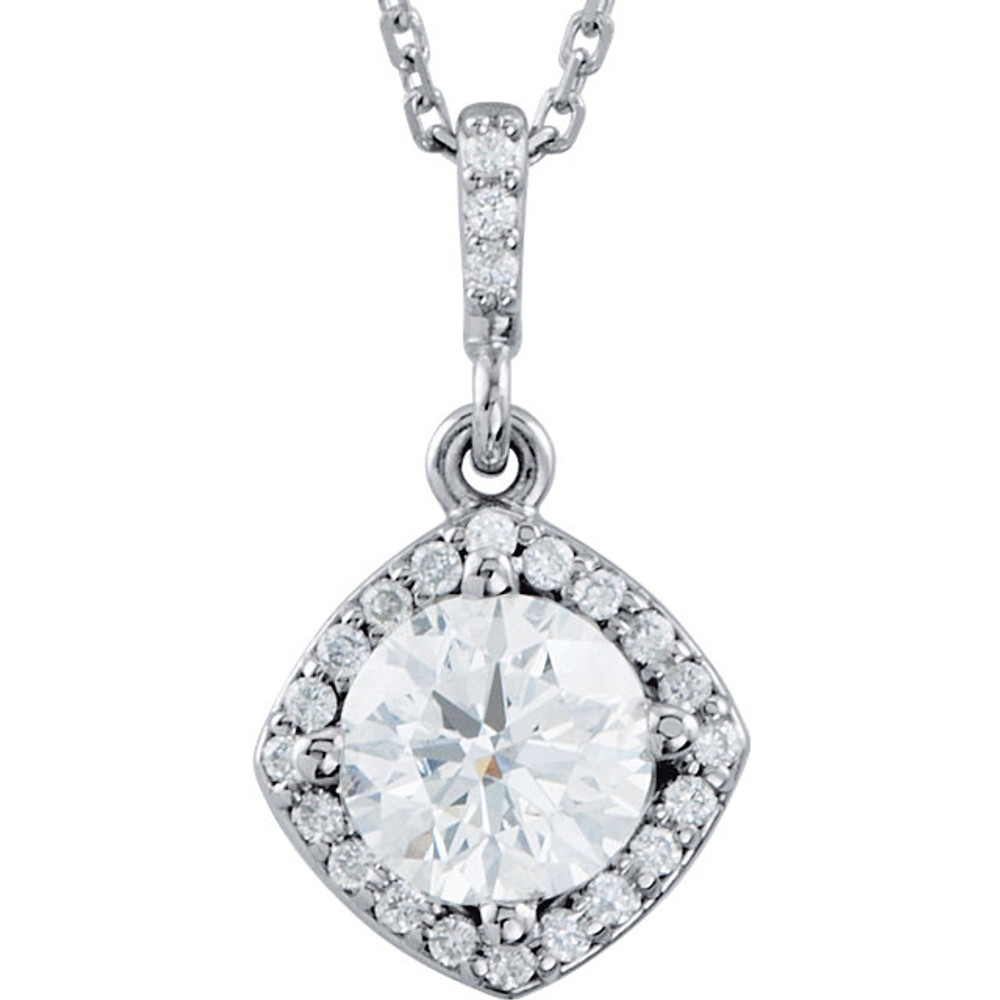 An impressive round diamond framed in additional round diamonds is the focal point of this extraordinary necklace for her. The pendant, fashioned in 14K white gold, is suspended from an 18-inch chain secured with a spring ring clasp. The total diamond weight is 7/8 carats.