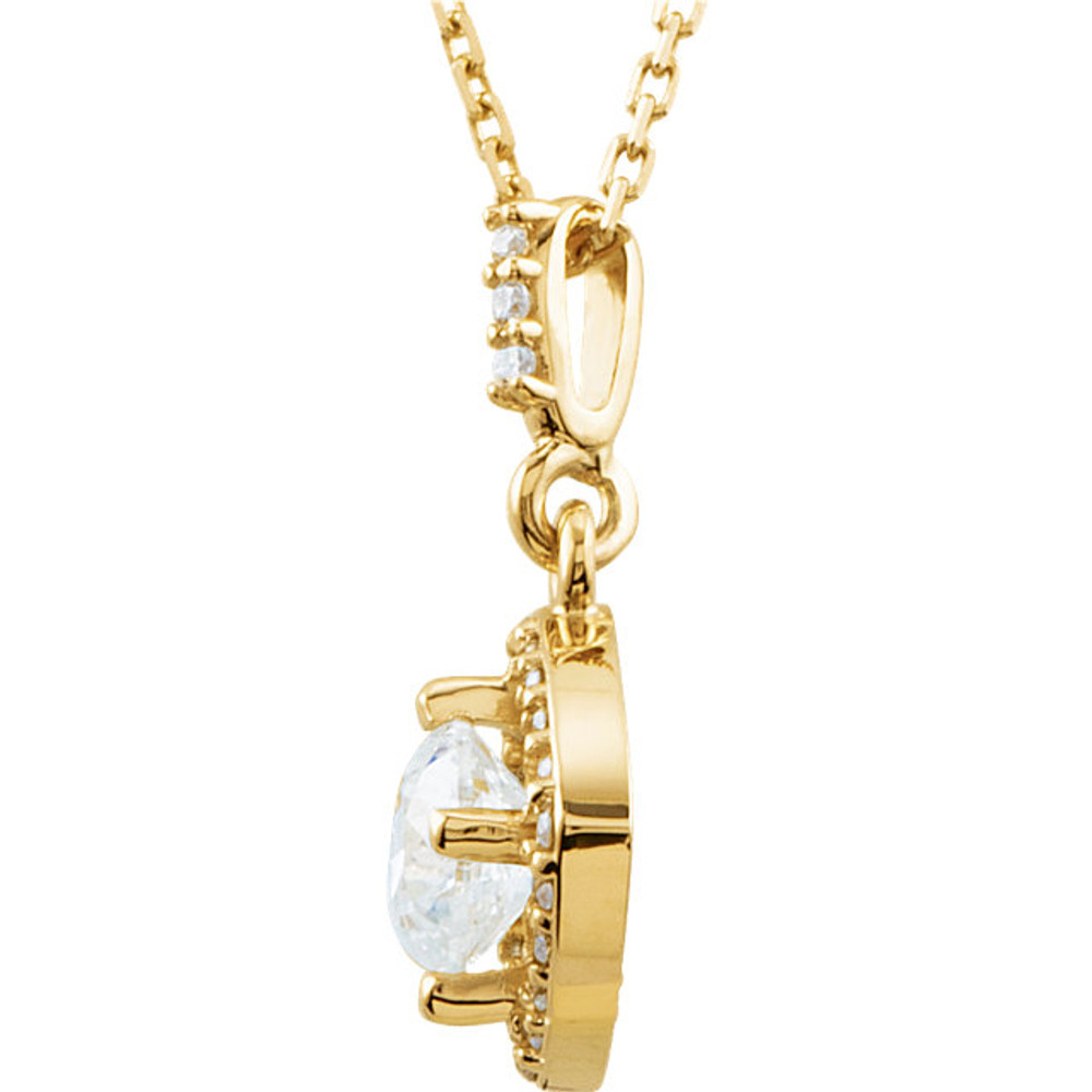 An impressive round diamond framed in additional round diamonds is the focal point of this extraordinary necklace for her. The pendant, fashioned in 14K yellow gold, is suspended from an 18-inch chain secured with a spring ring clasp. The total diamond weight is 3/8 carats.