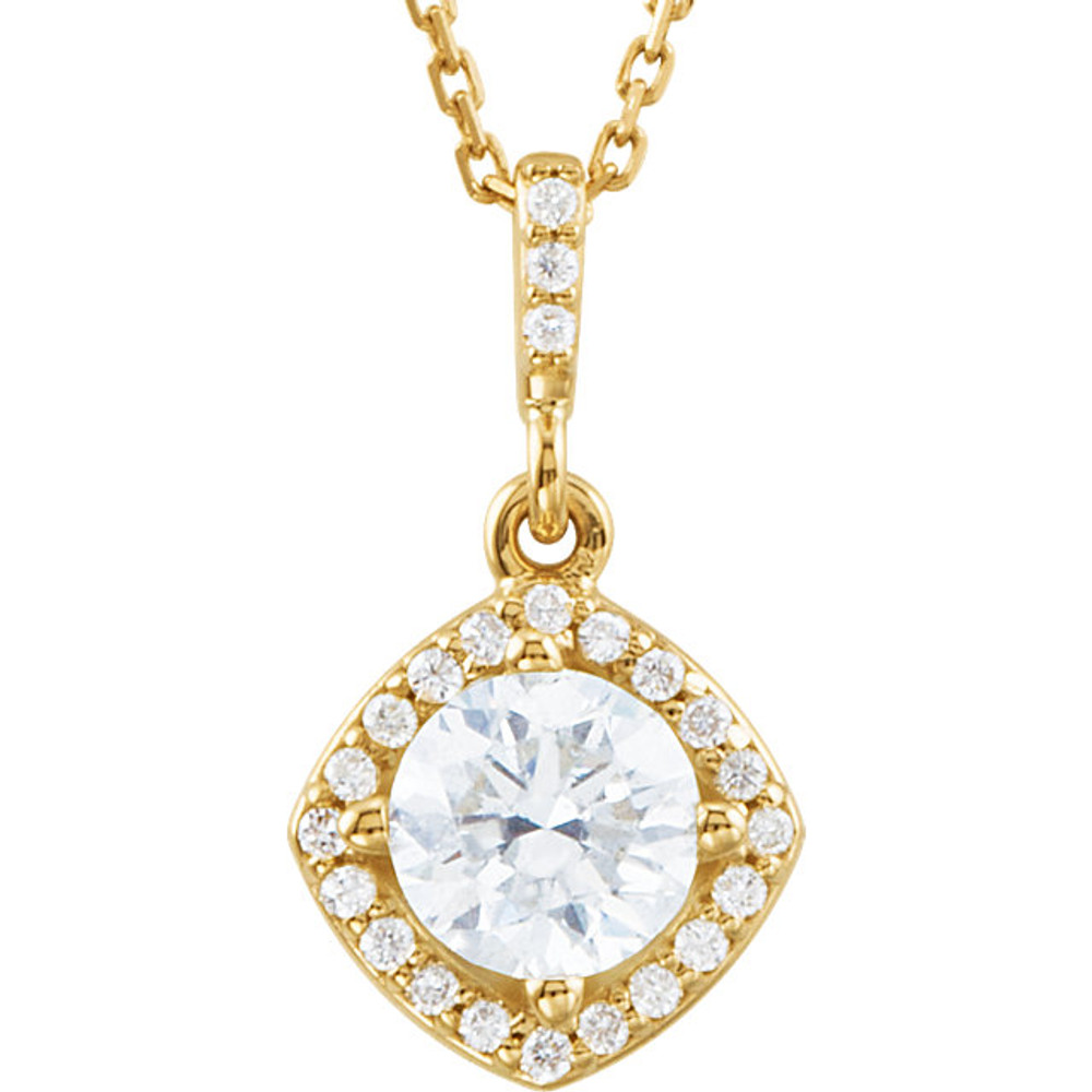 An impressive round diamond framed in additional round diamonds is the focal point of this extraordinary necklace for her. The pendant, fashioned in 14K yellow gold, is suspended from an 18-inch chain secured with a spring ring clasp. The total diamond weight is 7/8 carats.