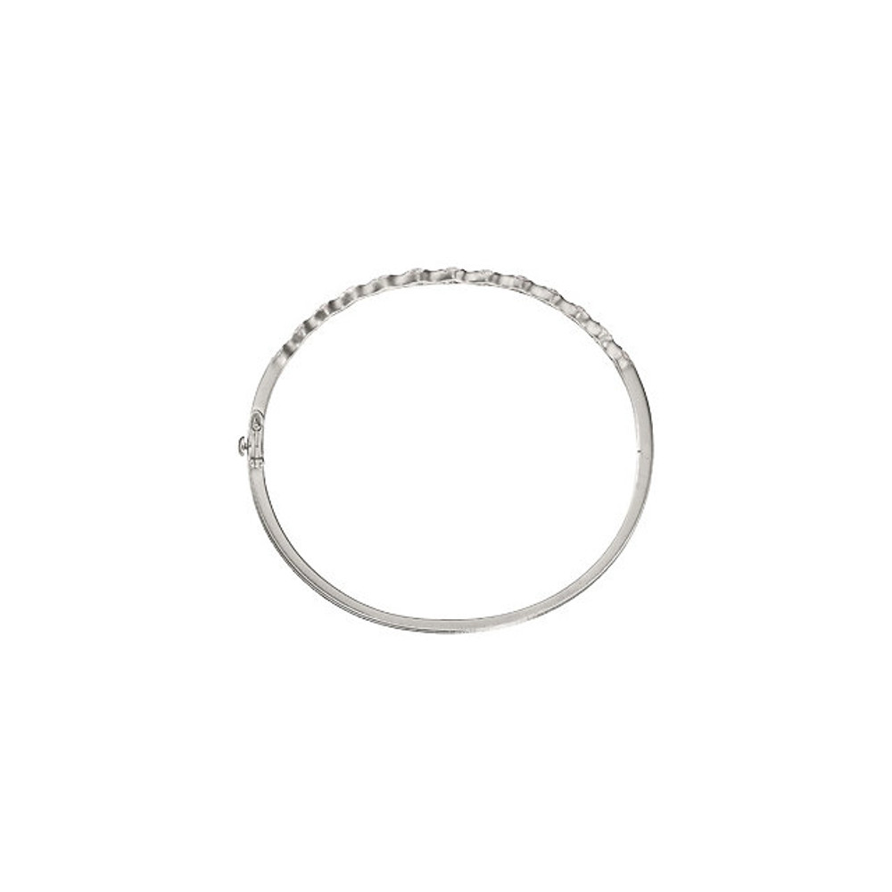 Wonderful modern style is found in this 14Kt white gold stackable diamond bracelet featuring a total carat weight of 1.00 carat. 