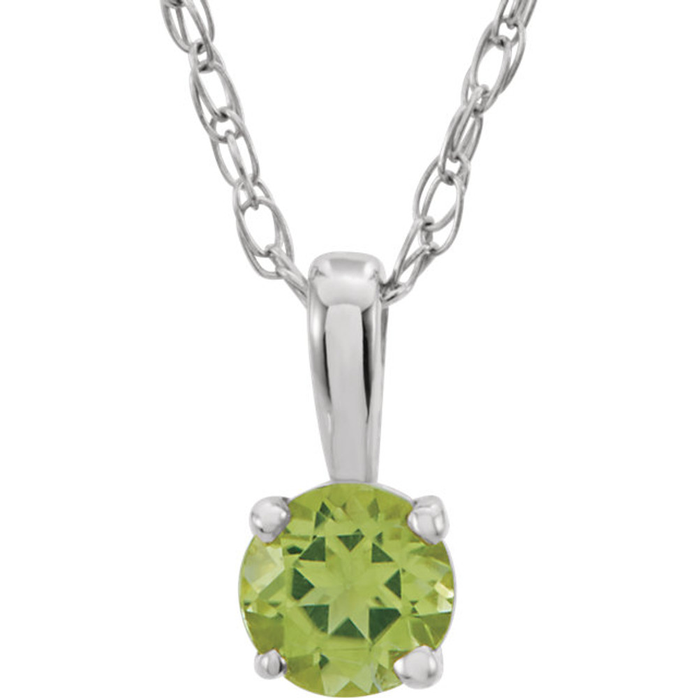 Peridot is the gem most often used to celebrate those born in August and as the popularity of lime green continues to grow, so does the youthful appeal of this citrus-hued gem. This classic 14-inch girls necklace features a faceted 3mm round gemstone in a four-prong basket setting and a 0.75mm laser welded loose rope chain finished with a spring-ring clasp made of 14k white gold. The genuine peridot is untreated and the stone weight is approximately 1/8 carat. The color range varies on all natural stones so please allow for slight variations in shades.