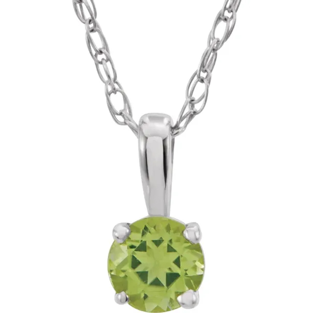 Peridot is the gem most often used to celebrate those born in August and as the popularity of lime green continues to grow, so does the youthful appeal of this citrus-hued gem. This classic 14-inch girls necklace features a faceted 3mm round gemstone in a four-prong basket setting and a 0.75mm laser welded loose rope chain finished with a spring-ring clasp made of 14k white gold.