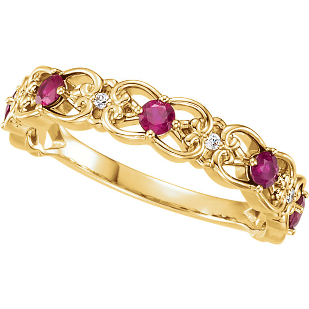 Truly beautiful design is found in this 14Kt yellow gold ring featuring red rubies and diamonds. Total weight of the gold is 3.10 grams.