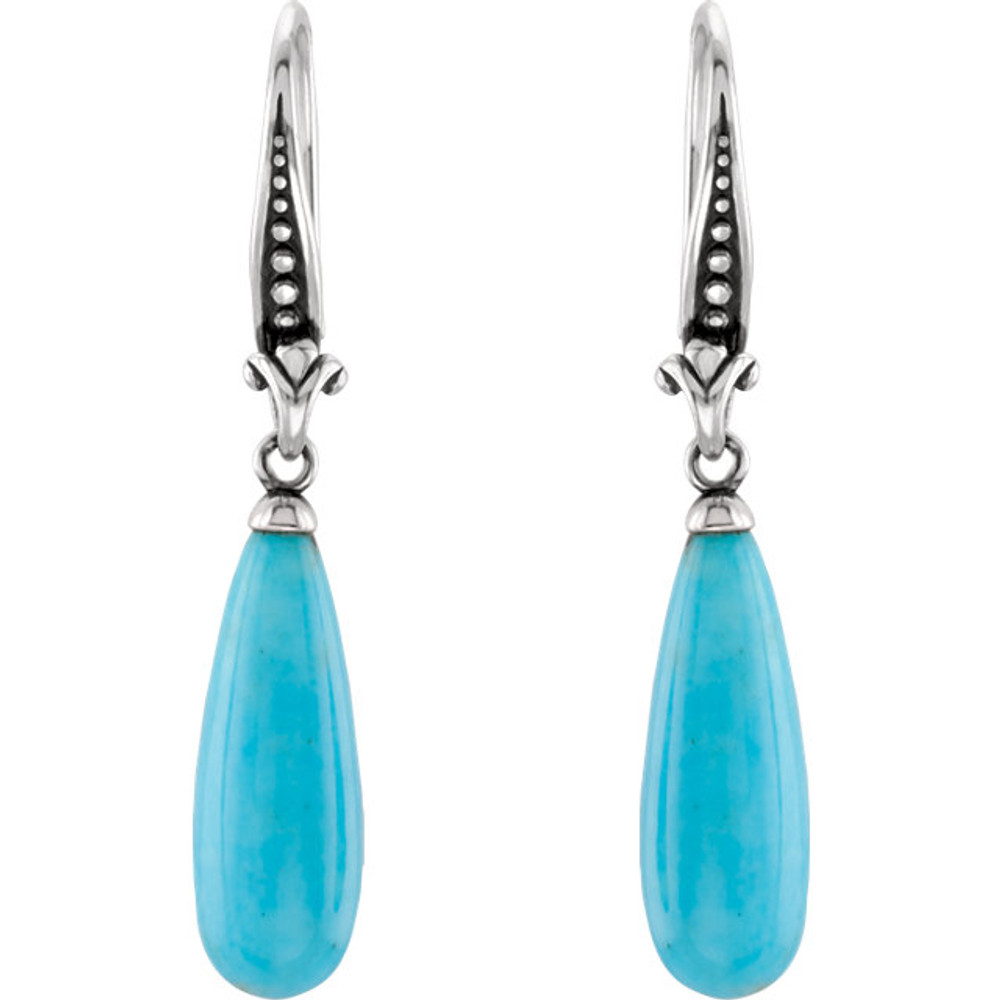 Wonderful sterling silver earrings with genuine turquoise 22 x 8mm in size and has a bright polish to shine.