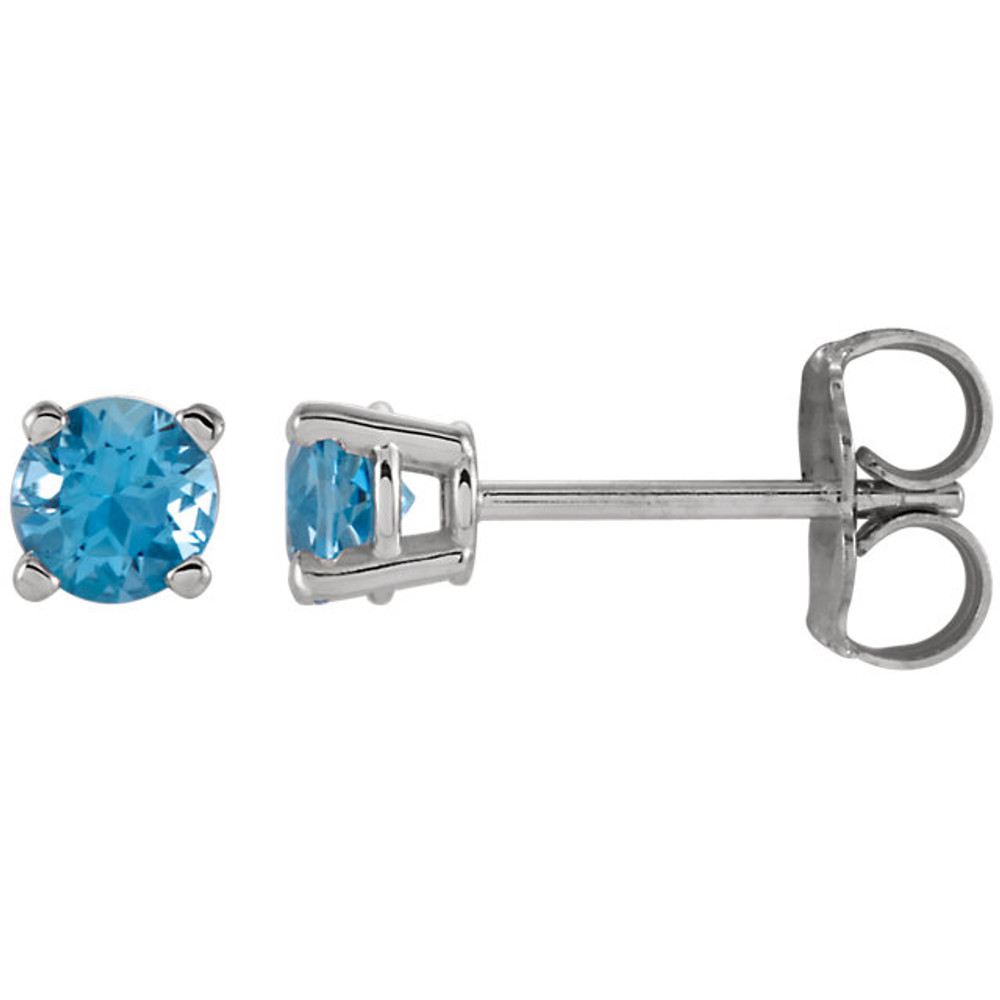 Delightfully colorful, these hand-selected gemstone earrings feature vibrant blue topaz gemstones complemented by 14k white gold four-prong settings.