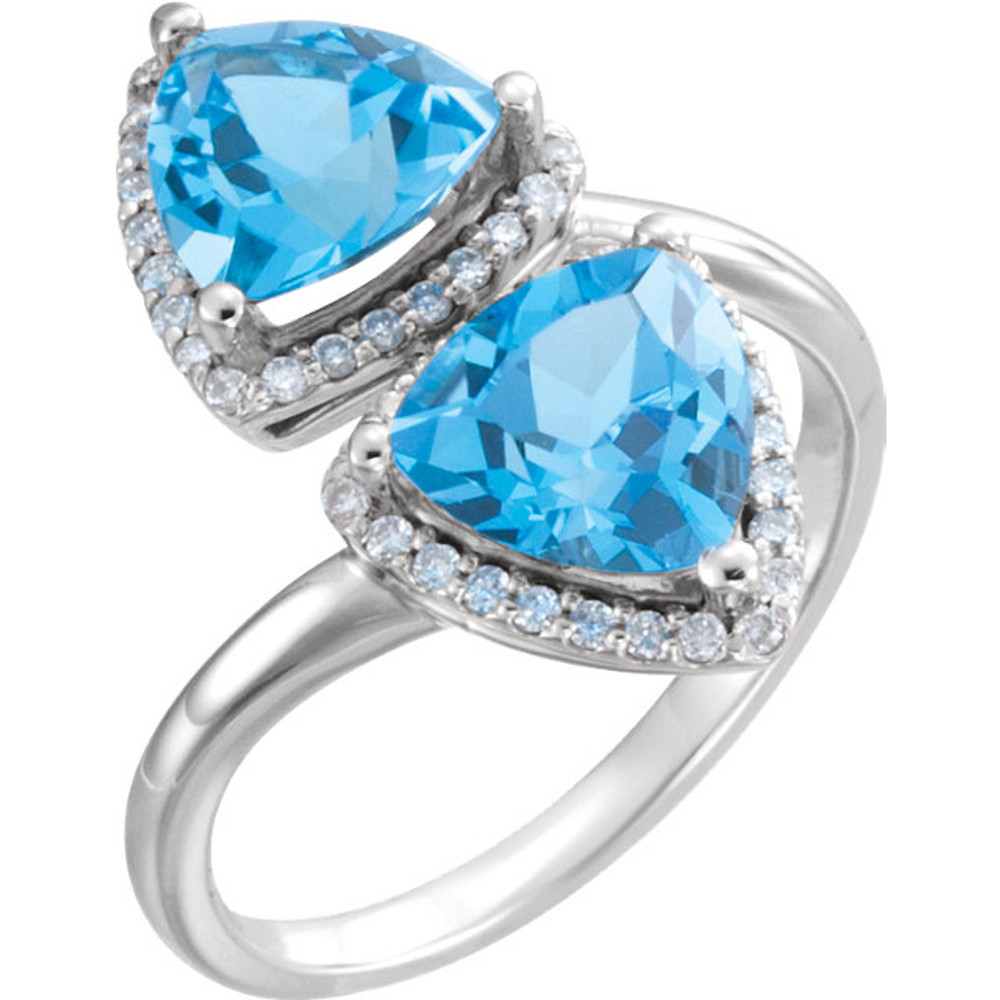 Made in white gold, this exquisite design features Swiss Blue Topaz gemstones accented with full cut diamonds. Both gemstones representing your friendship and loving commitment.