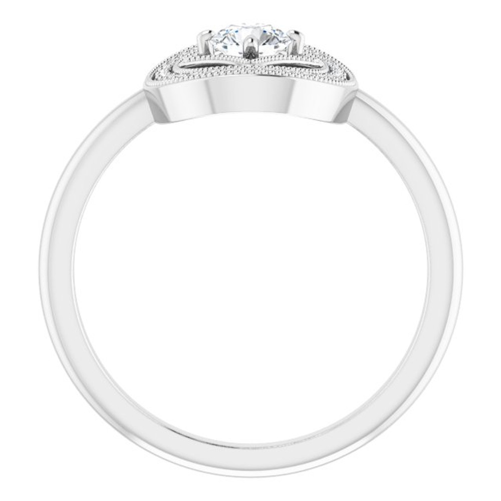 An unforgettable look, this dazzling diamond halo style ring simply captivates.