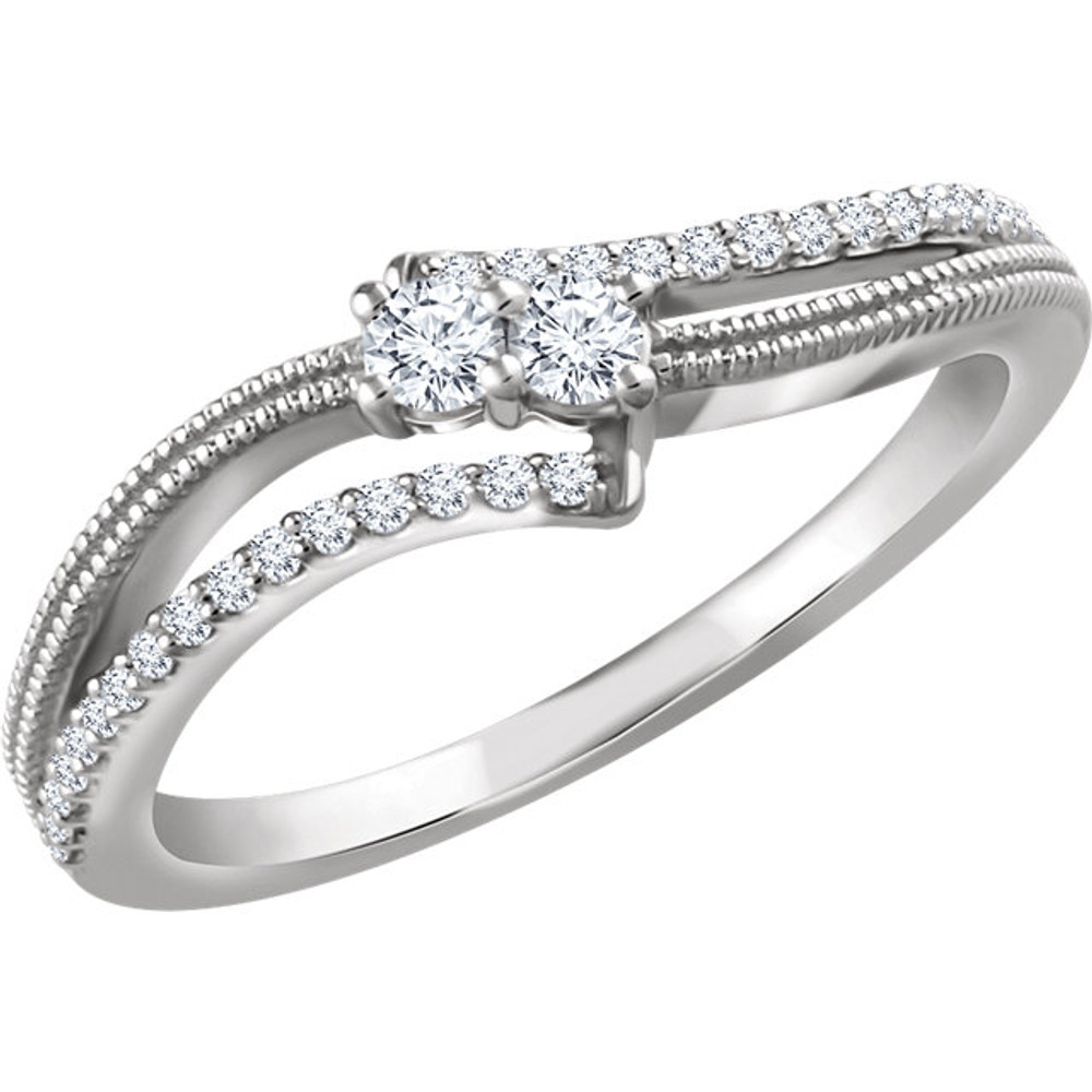 Stand out with this stunning two-stone ring, beautifully crafted of 14-karat white gold and set with genuine diamonds. A high polish finish completes the ring with a radiant shine. Both diamonds representing your friendship and loving commitment.