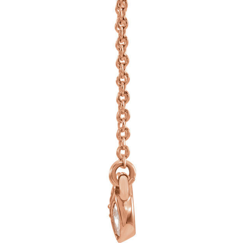 Beautiful 14Kt rose gold 3-stone marquise necklace featuring white shimmering diamonds with 1/4 carats of diamonds hanging from a adjustable 16-18" inch cable chain. Polished to a brilliant shine. 