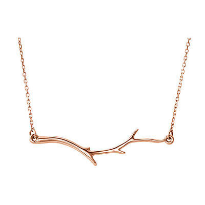 Stunning design is found in this 14k rose gold branch bar hanging from a 16.00" inch necklace in length. Total weight of the gold is 2.34 grams.