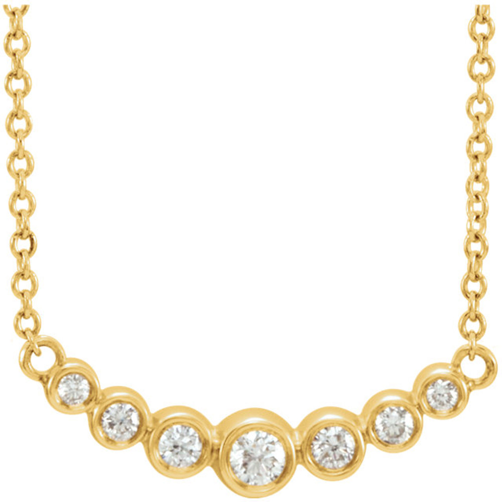 Beautiful 14Kt yellow gold bezel set 1/5 ct. tw. diamond necklace hanging from a 16-18" inch chain which is included.