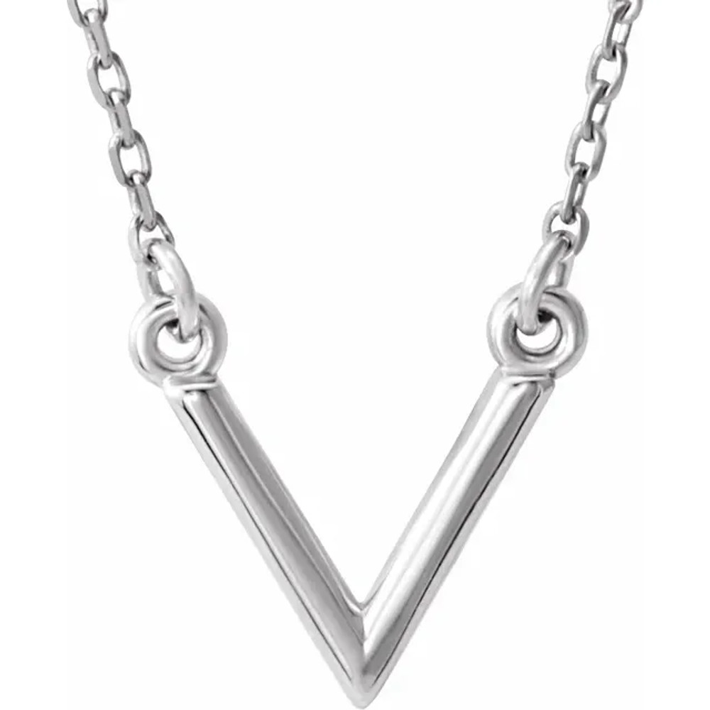 Stunning design is found in this platinum "V" geometric pendant hanging from a platinum necklace 16.50" inches in length. Total weight of the platinum is 2.66 grams.