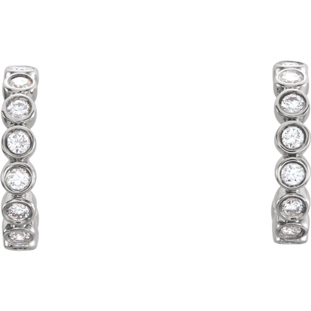 Perfect for a look of sheer elegance, these diamond bezel set hoop earrings feature gorgeous diamonds framed in striking 14k white gold.