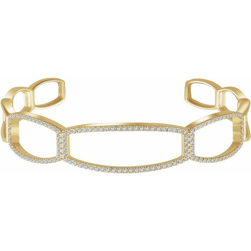 Refined elegance is found in this 14Kt yellow gold diamond cuff 6 1/4" bracelet. Total weight of the diamonds is .75cts. Total weight of the gold is 12.10 grams.