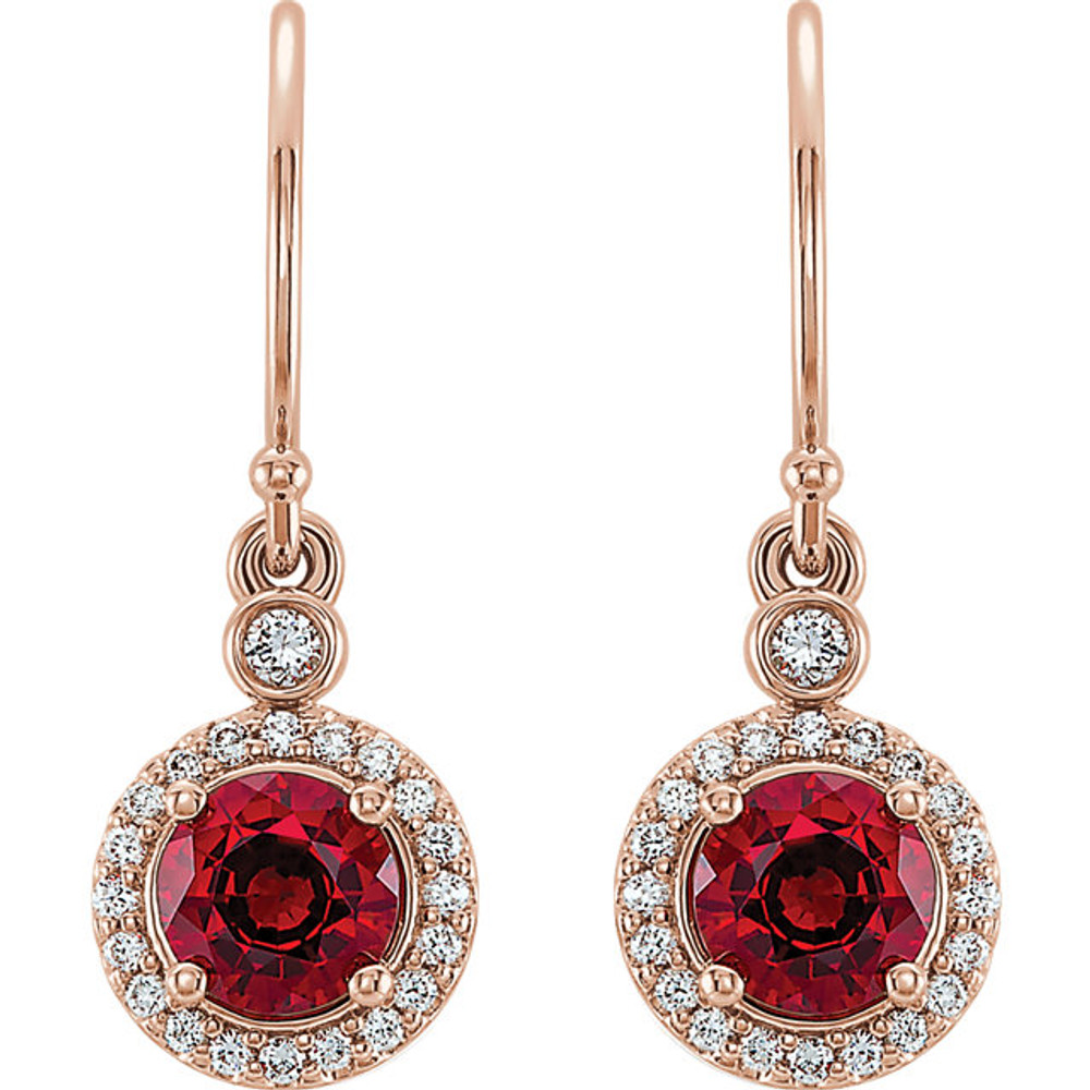 Wonderful 14Kt rose gold halo-style earrings capturing the beauty of Chatham® created ruby surrounded by .08 carat total weight of white diamonds.