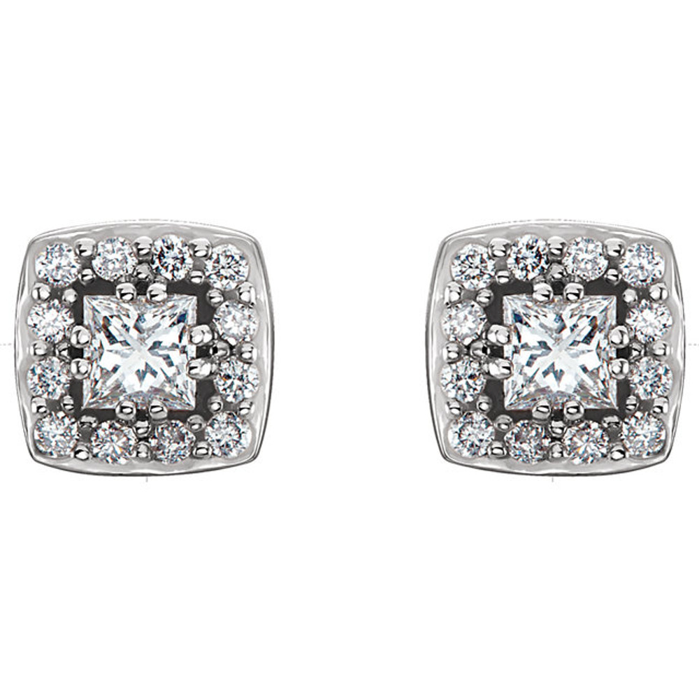 These exquisite diamond cluster stud earrings offer beauty equaled only to her own. Stunning in 14K white gold, these earrings feature 26 dazzling diamonds. Classic and elegant, these earrings captivate with 1/2 ct. t.w. of diamonds and a polished shine.