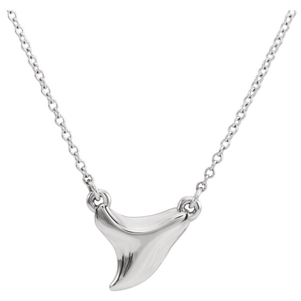 Take a bite out of style with this Sterling Silver Shark Tooth Pendant Necklace! The shark tooth charm has so many details, it looks like you could have picked it from the ocean and had is dipped in silver. Have the shark tooth pendant dangle from a 16 or 18 inch sterling silver cable chain. Wear a shark tooth necklace this Summer as a playful ocean inspired necklace!