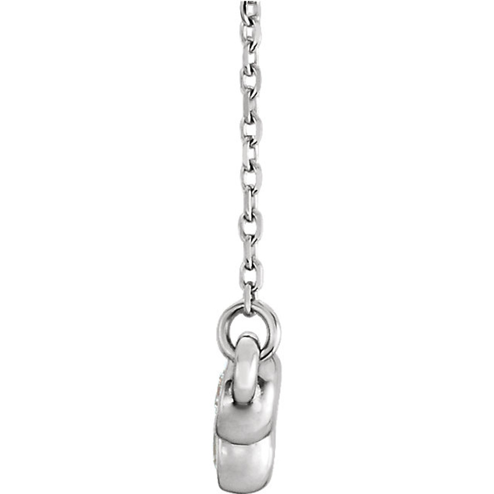 Beautiful platinum graduated bezel set 1/2 ct. tw. diamond necklace hanging from a 16-18" inch chain which is included.