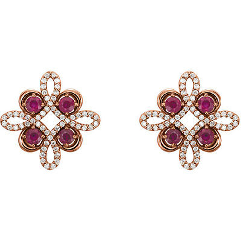 Beautiful 14k rose gold clover earrings featuring eight gorgeous rubies and 1/4 total carat weight of diamonds. 