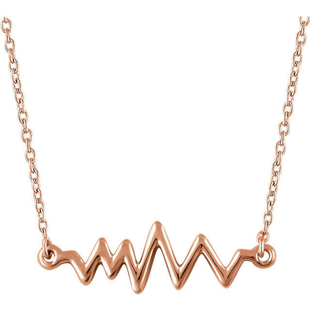  Decorated with a heartbeat link, this 14k gold necklace enhances your outfit with steadfast style. 