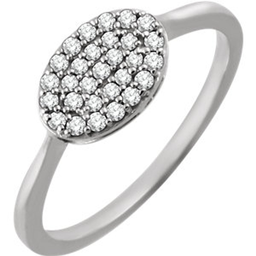 Chic, modern, playful, geometric, stunning, sharp, elegant, sophisticated and stylish... This diamond oval cluster ring really has a lot to say for itself. It contains 29 shimmering diamonds weighing 1/5 ct tw within a dazzling oval shape. It's design seems simple, but also evokes elegance. It is pictured here in 14kt white gold.