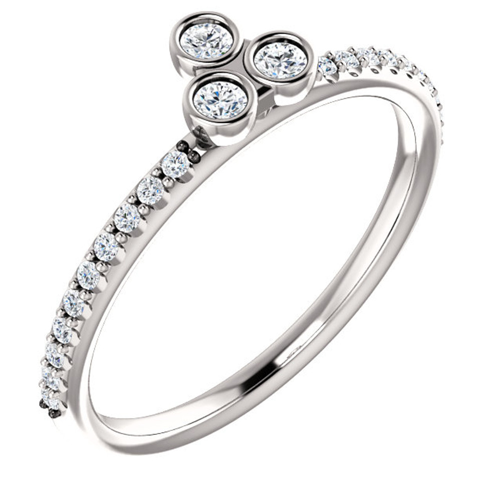 Celebrate a special occasion with this sparkling three-stone asymmetrical stackable diamond ring. This lovely, 1/5 ct. tw. diamond three-stone stackable ring is fashioned from high-polished 14K white gold. Diamonds are G-H in color and I1 or better in clarity.
