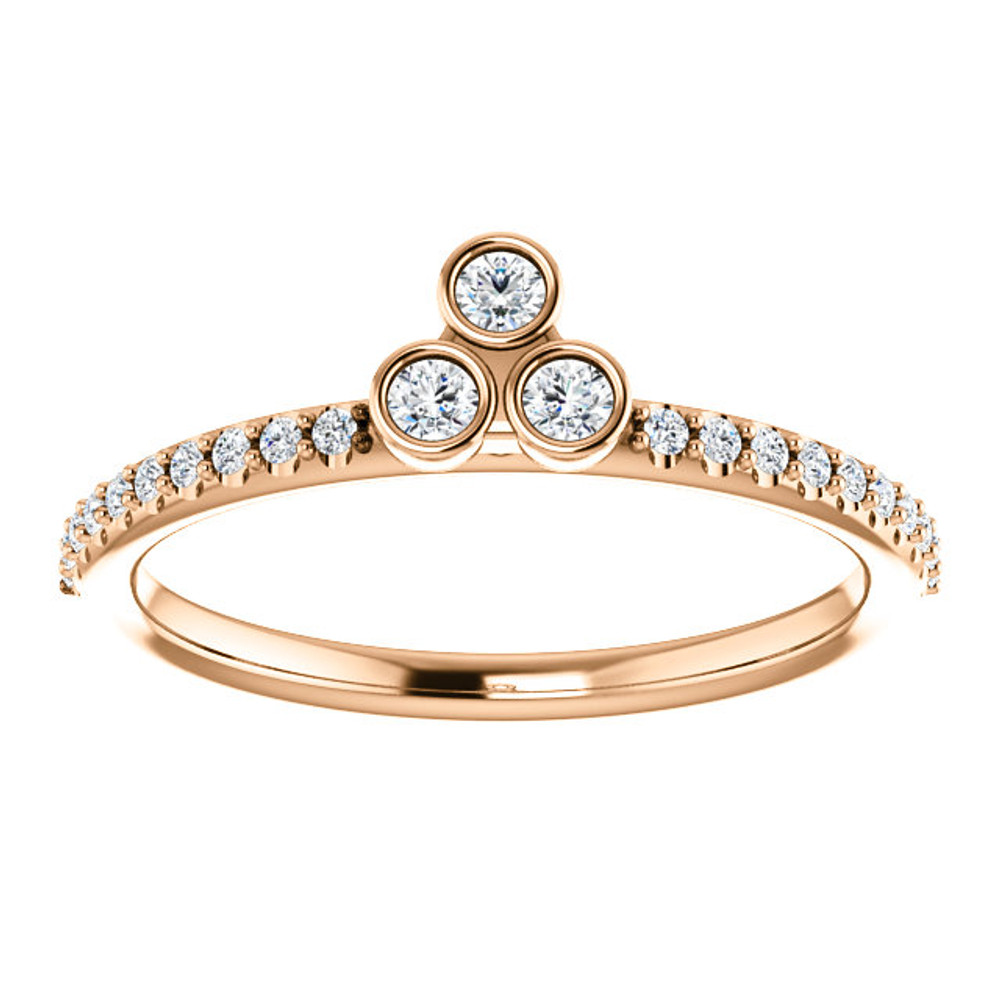 Celebrate a special occasion with this sparkling three-stone asymmetrical stackable diamond ring. This lovely, 1/5 ct. tw. diamond three-stone stackable ring is fashioned from high-polished 14K rose gold. Diamonds are G-H in color and I1 or better in clarity.