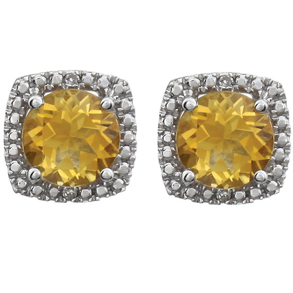 Beautiful sterling silver Citrine November birthstone diamond earrings with .015 ct tw. Say "I love you" to any woman in your life; a friend, mother, wife, girlfriend, daughter. All earrings are sold in pairs.