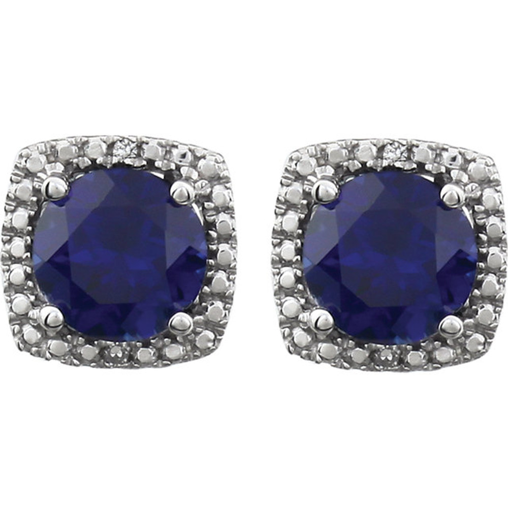 Beautiful sterling silver created blue sapphire september birthstone diamond earrings with .015 ct tw. Say "I love you" to any woman in your life; a friend, mother, wife, girlfriend, daughter. All earrings are sold in pairs.