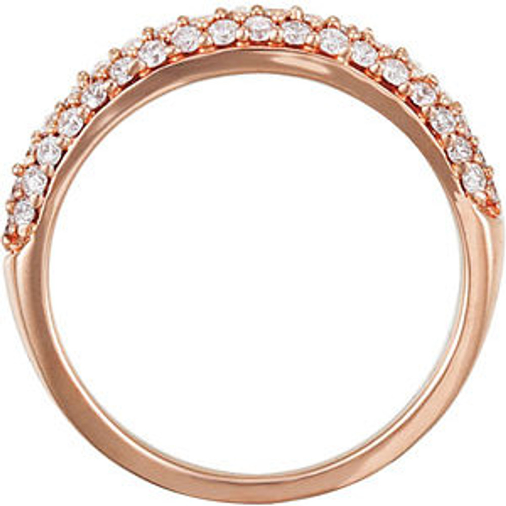 Shimmering round brilliant diamonds encircle this elegant anniversary band designed in 14K rose gold and featuring pave-setting.